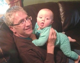 A person holding a baby

AI-generated content may be incorrect.