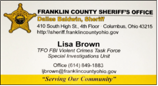 Close-up of a business card

Description automatically generated