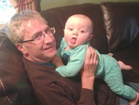 A person holding a baby

AI-generated content may be incorrect.