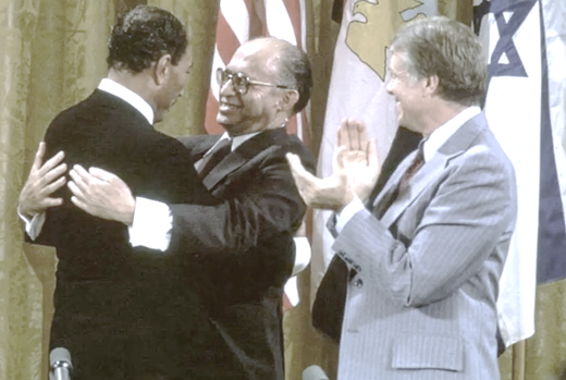 Men in suits hugging each other

AI-generated content may be incorrect.