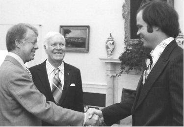 A few men shaking hands

AI-generated content may be incorrect.