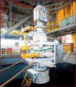 A large machine in a factory

Description automatically generated