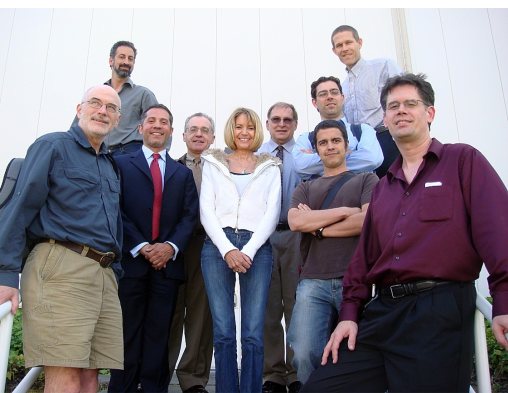 A group of people posing for a photo

Description automatically generated