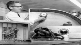 A person working on a machine

Description automatically generated