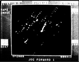 A black and white photo of a black background

Description automatically generated