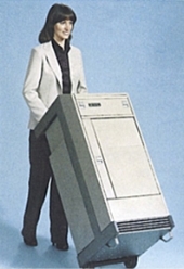 A person pushing a computer

Description automatically generated