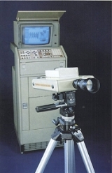 A close-up of a camera

Description automatically generated