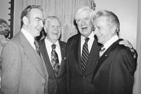 A group of men in suits

Description automatically generated