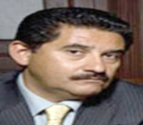 A person with a mustache

Description automatically generated