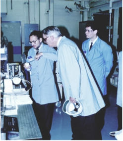 A few men in lab coats

AI-generated content may be incorrect.