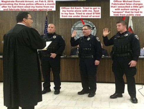 A person in a black robe standing in front of police officers

Description automatically generated