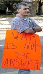 A person with a sign

Description automatically generated