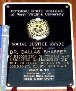 A plaque with a gold medallion

AI-generated content may be incorrect.