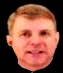A person with short hair

Description automatically generated